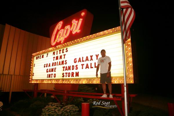 TOM CHANGING THE SIGN